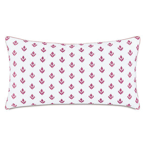 A king size sham pillow with a white background and a repeating magenta-pink floral pattern, finished with a thin pink piped edge.